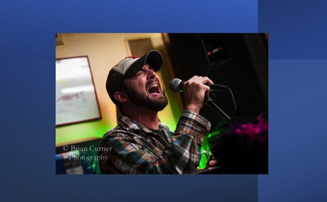 Tim singing karoke