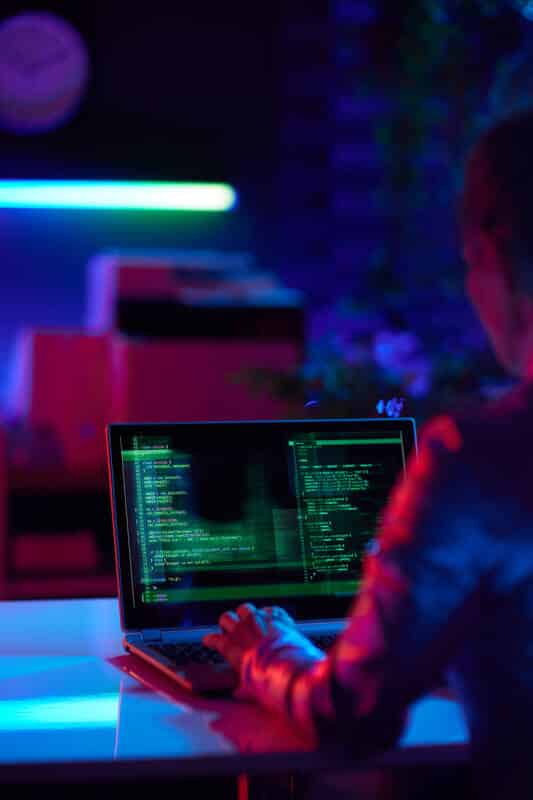 software developer with red and blue lighting